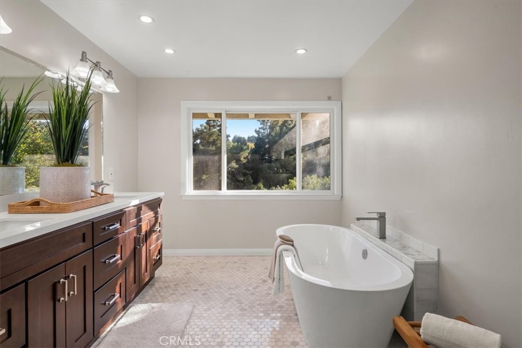 54 Ranchview Road Rolling Hills Estates, CA 90274 - Photo 40 of 60 a bathroom with a sink and a bathtub