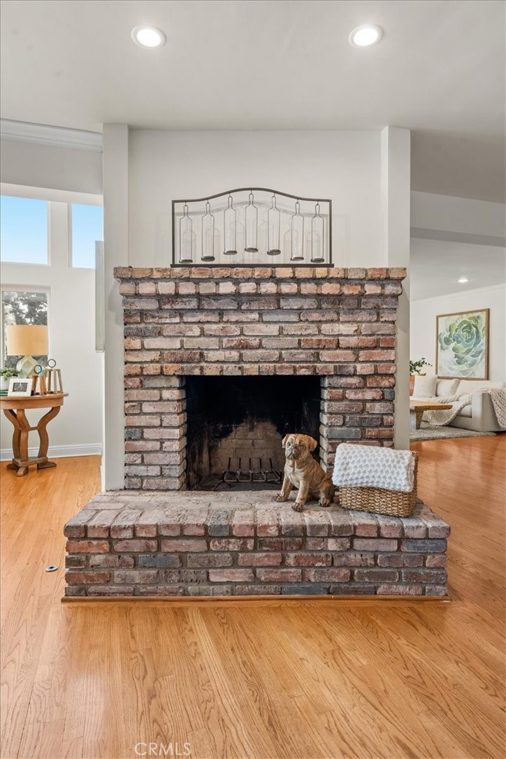 54 Ranchview Road Rolling Hills Estates, CA 90274 - Photo 5 of 60 a living room with fireplace furniture and a wooden floor