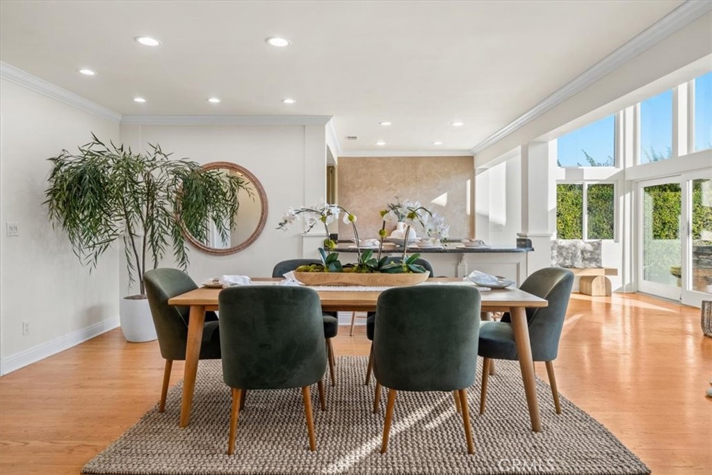 54 Ranchview Road Rolling Hills Estates, CA 90274 - Photo 6 of 60 a view of a dining room with furniture window and wooden floor