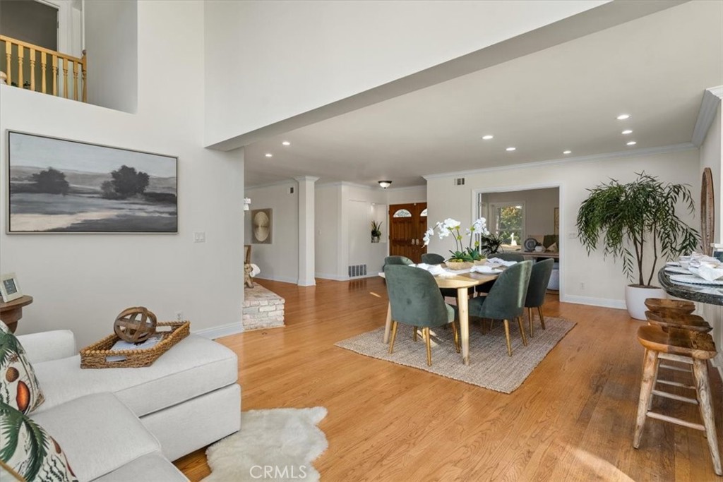 54 Ranchview Road Rolling Hills Estates, CA 90274 - Photo 8 of 60 a living room with furniture a dining table and kitchen view