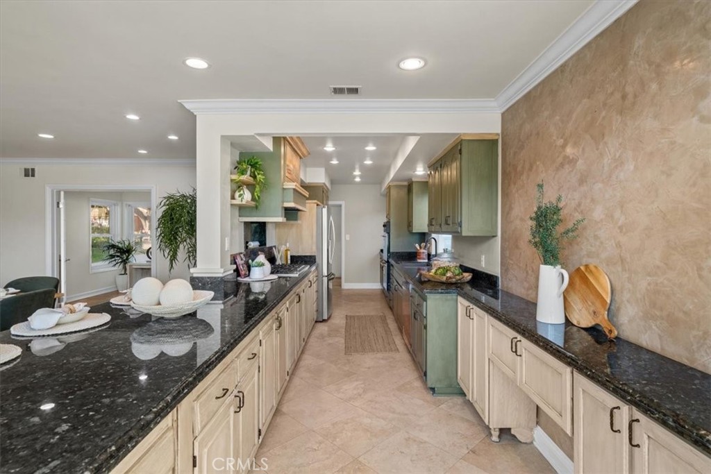 54 Ranchview Road Rolling Hills Estates, CA 90274 - Photo 10 of 60 a large kitchen with lots of counter space and stainless steel appliances