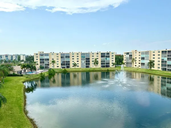 a view of a lake with a city