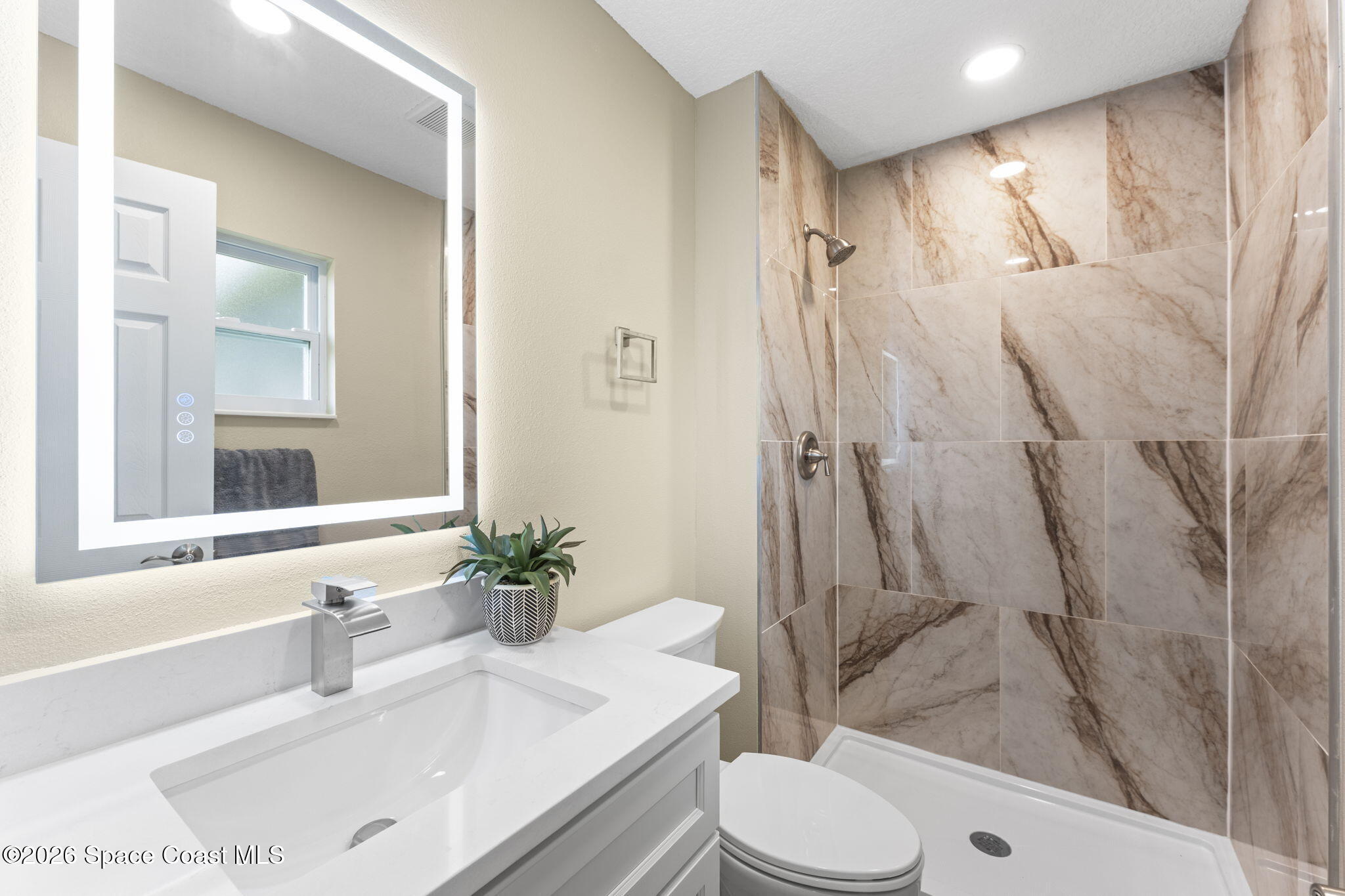 3660 Longbow Road Cocoa, FL 32926 - Photo 23 of 35 23-web-or-mls-Longbow.PrimaryBath.3