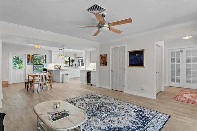 a living room with furniture and a rug