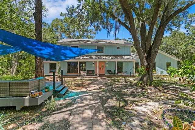 a bedroom with a bed furniture and a window