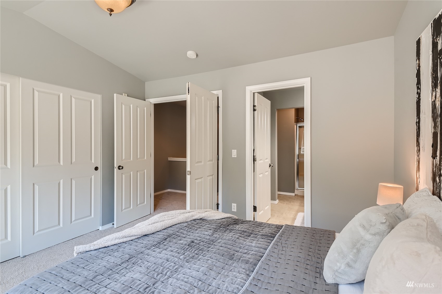 1054 215th Place Southeast Bothell, WA 98021 - Photo 14 of 28 a bedroom with a bed and a window
