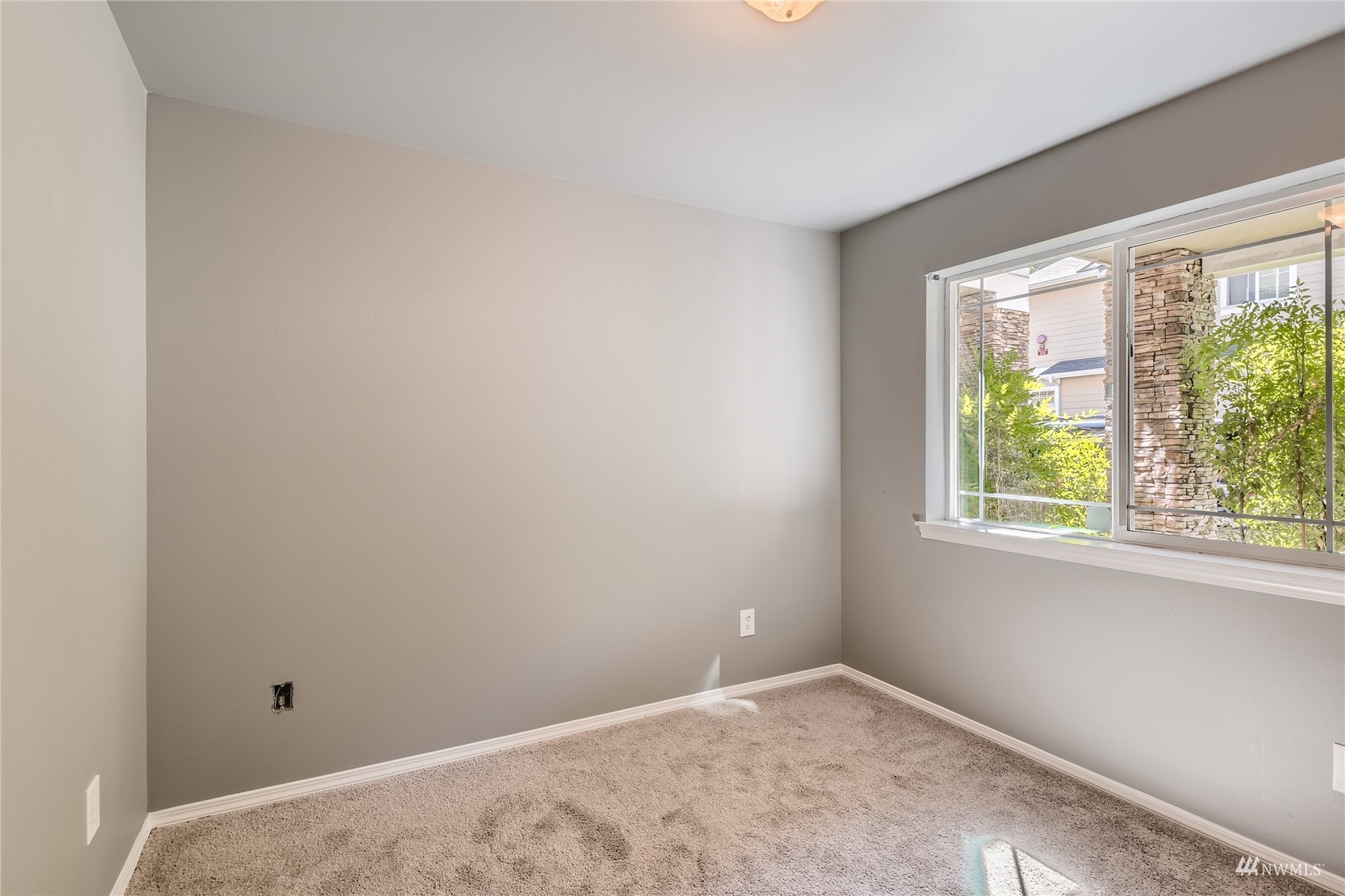 1054 215th Place Southeast Bothell, WA 98021 - Photo 21 of 28 an empty room with a window