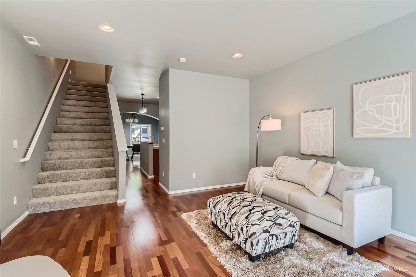 1054 215th Place Southeast Bothell, WA 98021 - Photo 6 of 28 a living room with furniture and wooden floor