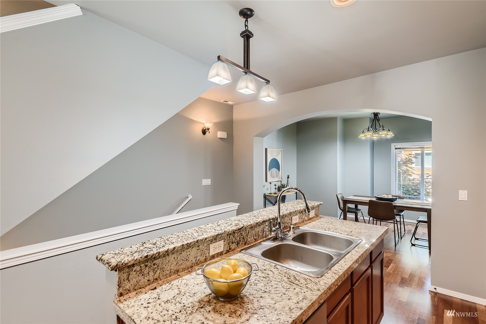 1054 215th Place Southeast Bothell, WA 98021 - Photo 10 of 28 a bathroom with a granite countertop sink a vanity and mirror