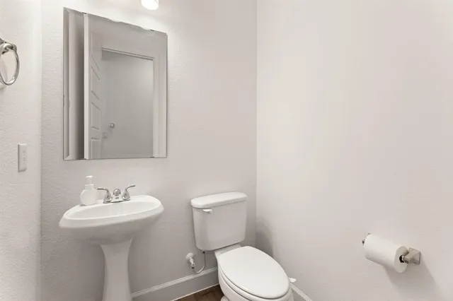 a kitchen with stainless steel appliances kitchen island granite countertop a stove a sink and a microwave