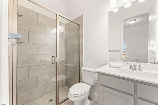 a room with a bed a table and chair