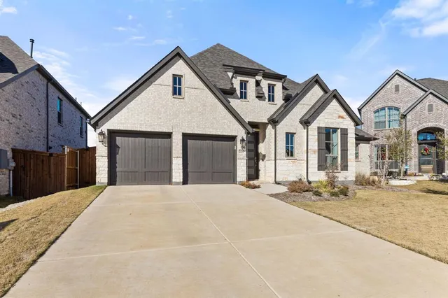 a view of a park with iron fence