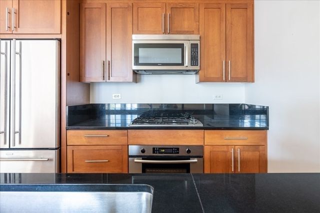 $885,000 | 21 Father Francis Gilday Street, Unit 301, Boston, MA 02118