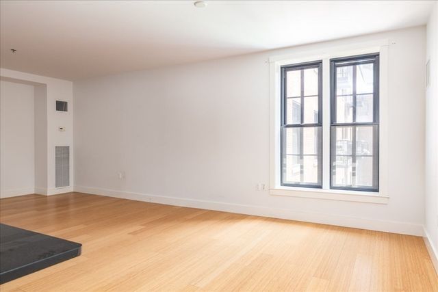 $885,000 | 21 Father Francis Gilday Street, Unit 301, Boston, MA 02118