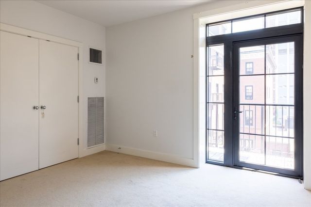 $885,000 | 21 Father Francis Gilday Street, Unit 301, Boston, MA 02118