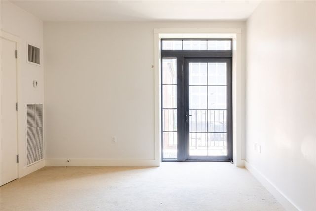 $885,000 | 21 Father Francis Gilday Street, Unit 301, Boston, MA 02118