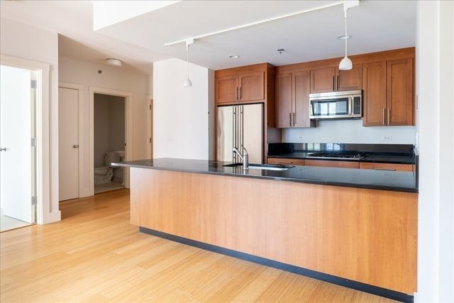 $885,000 | 21 Father Francis Gilday Street, Unit 301, Boston, MA 02118