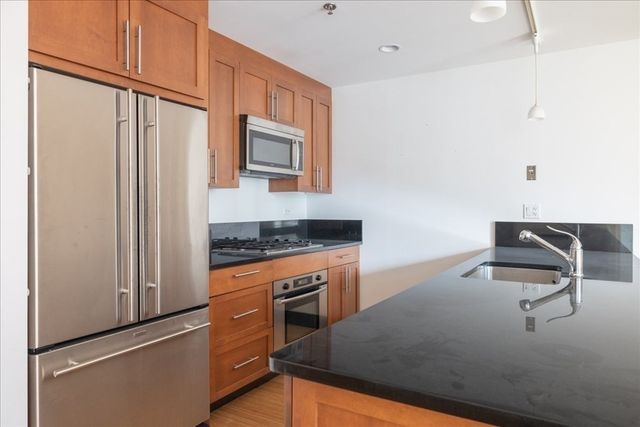 $885,000 | 21 Father Francis Gilday Street, Unit 301, Boston, MA 02118