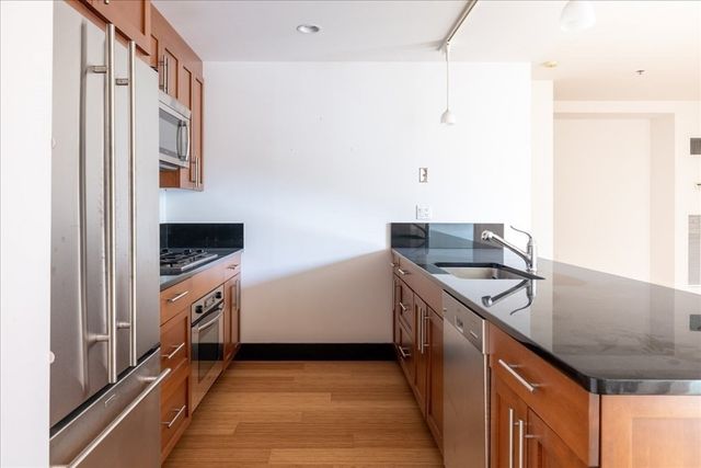 $885,000 | 21 Father Francis Gilday Street, Unit 301, Boston, MA 02118