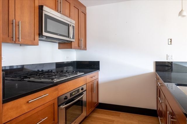 $885,000 | 21 Father Francis Gilday Street, Unit 301, Boston, MA 02118