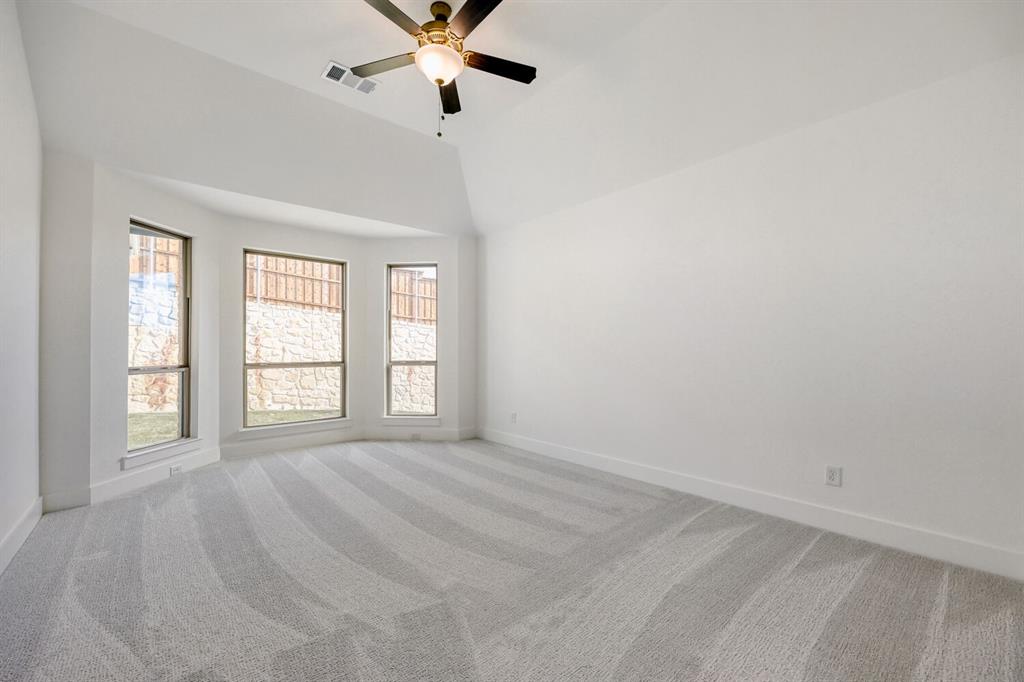 180 Buffalo Boulevard Rhome, TX 76078 - Photo 9 of 28 a view of an empty room with a window