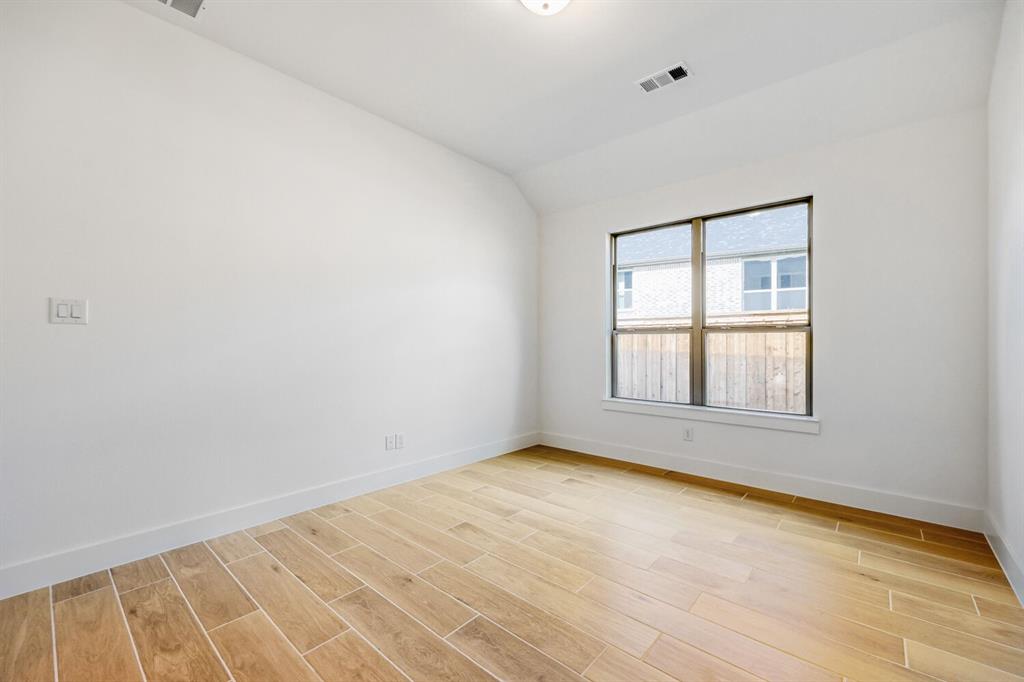 180 Buffalo Boulevard Rhome, TX 76078 - Photo 13 of 28 an empty room with a window