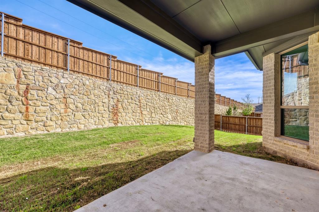 180 Buffalo Boulevard Rhome, TX 76078 - Photo 22 of 28 a view of a back yard