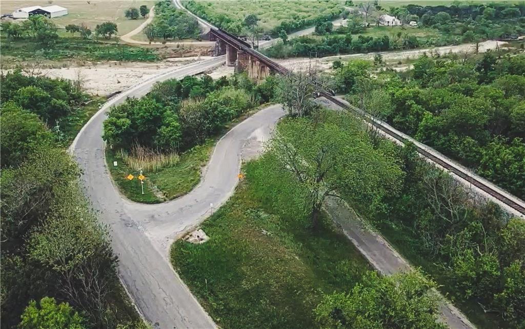 Antonio-austin Post Road San Marcos, TX 78666 - Photo 5 of 5 an aerial view of residential house with outdoor space and trees all around