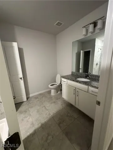 a bathroom with a sink and a toilet