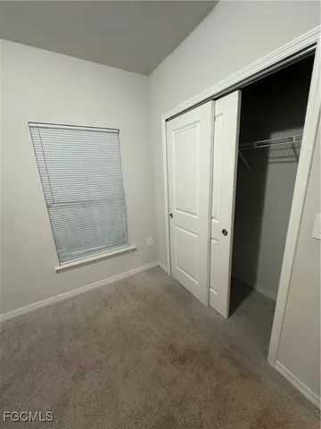 an empty room with closet