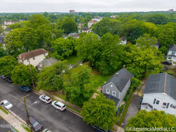 an aerial view of a house with a garden