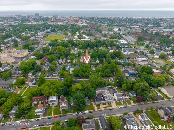 an aerial view of a city with lots of residential buildings