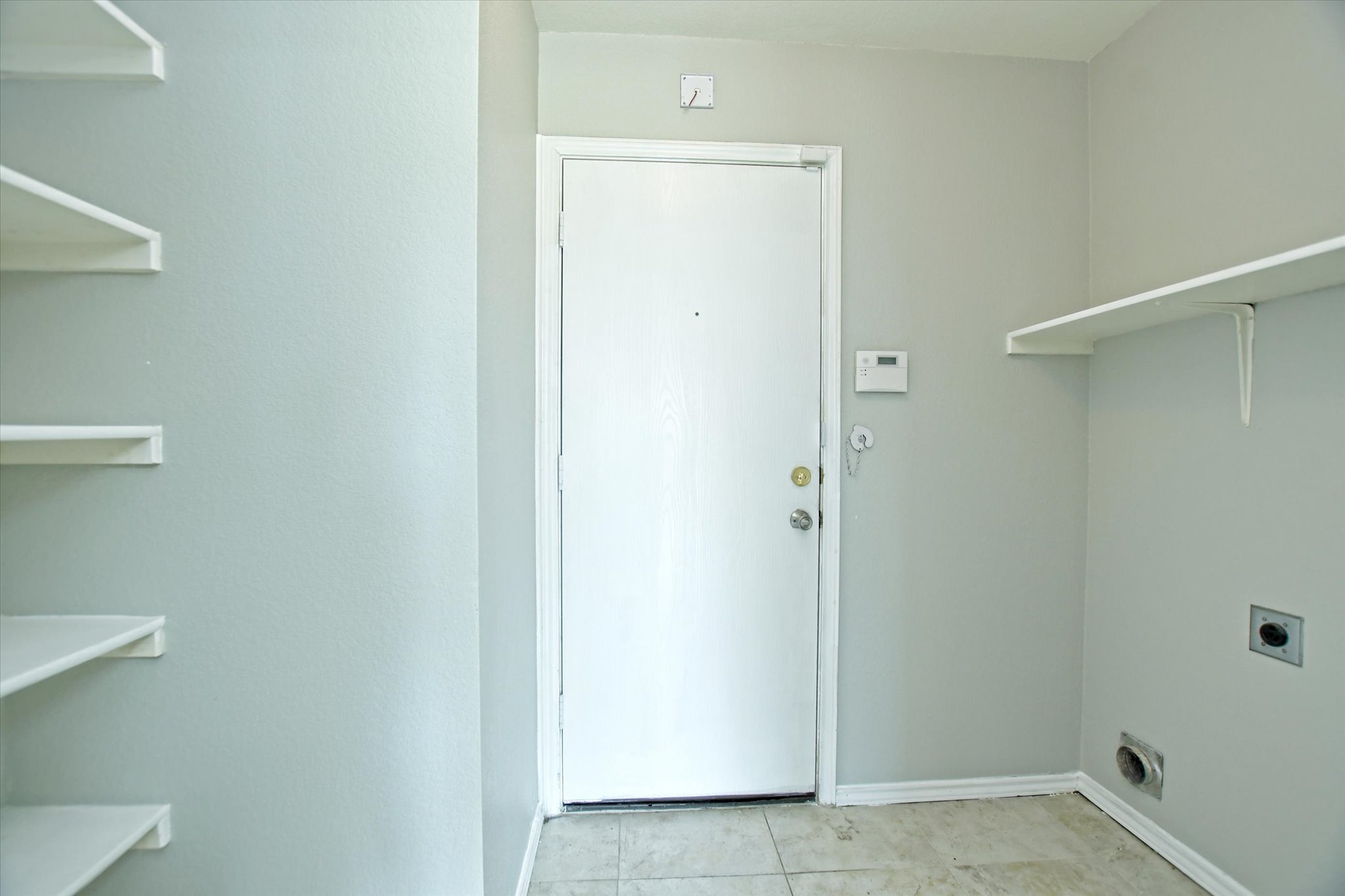 102 Blanco Woods Boulevard Elgin, TX 78621 - Photo 28 of 31 Laundry and pantry
