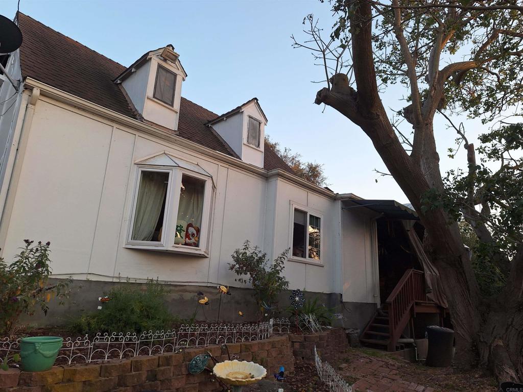 1640 Ojeda Road Vista, CA 92084 - Photo 1 of 5 a front view of a house with garden