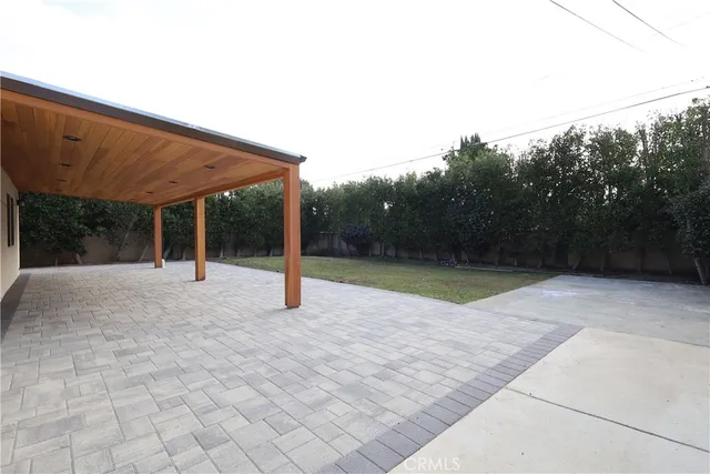 a view of swimming pool with an outdoor space and seating area