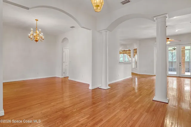 a kitchen with wooden cabinets and center island