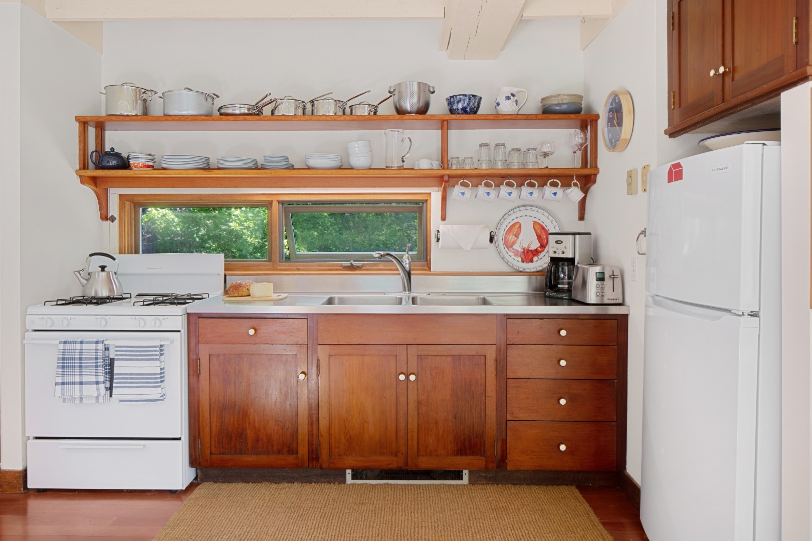 18 Allen Farm Road Chilmark, MA 02535 - Photo 4 of 13 a kitchen with stainless steel appliances granite countertop a refrigerator and a stove