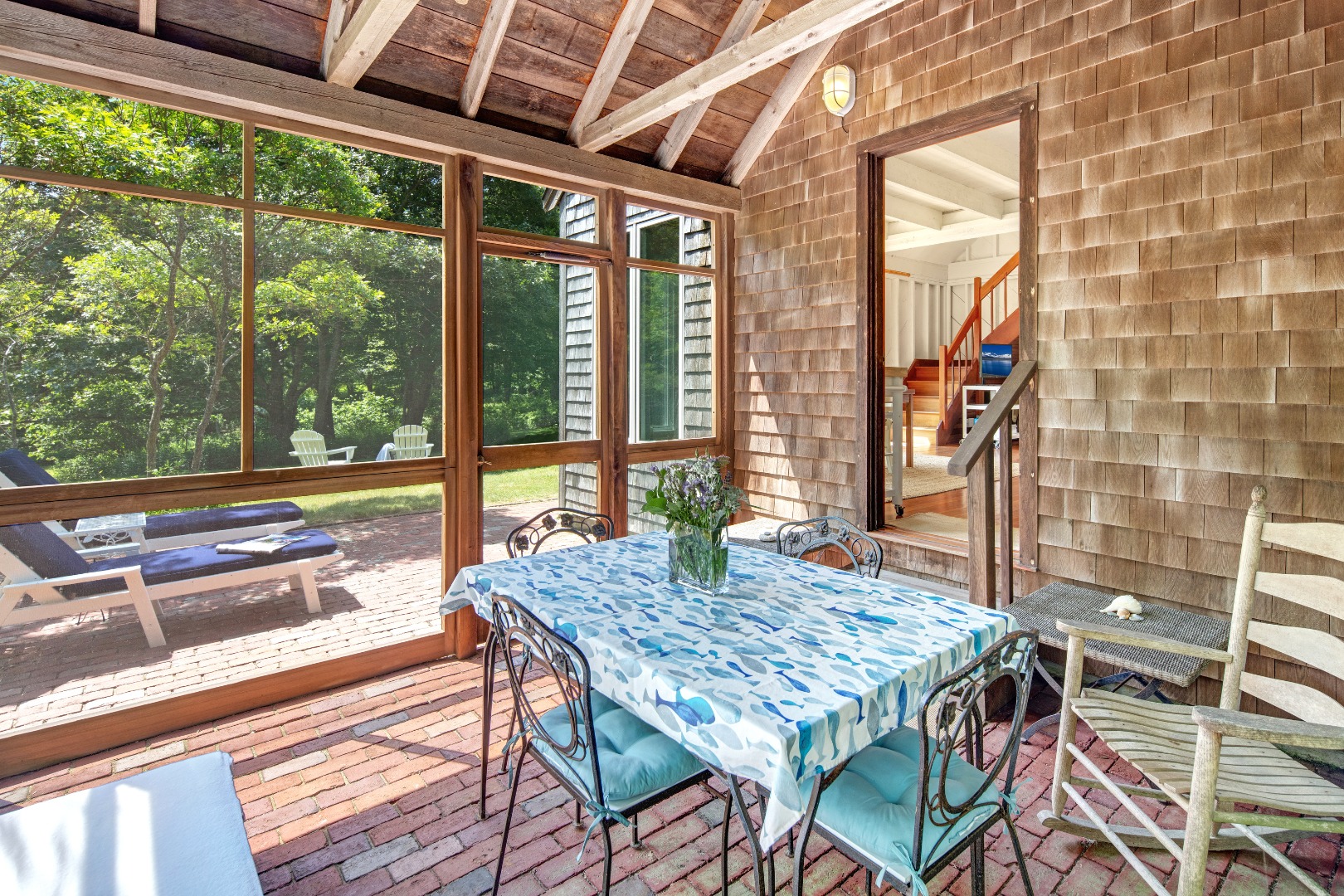 18 Allen Farm Road Chilmark, MA 02535 - Photo 6 of 13 a roof deck with table and chairs and wooden floor