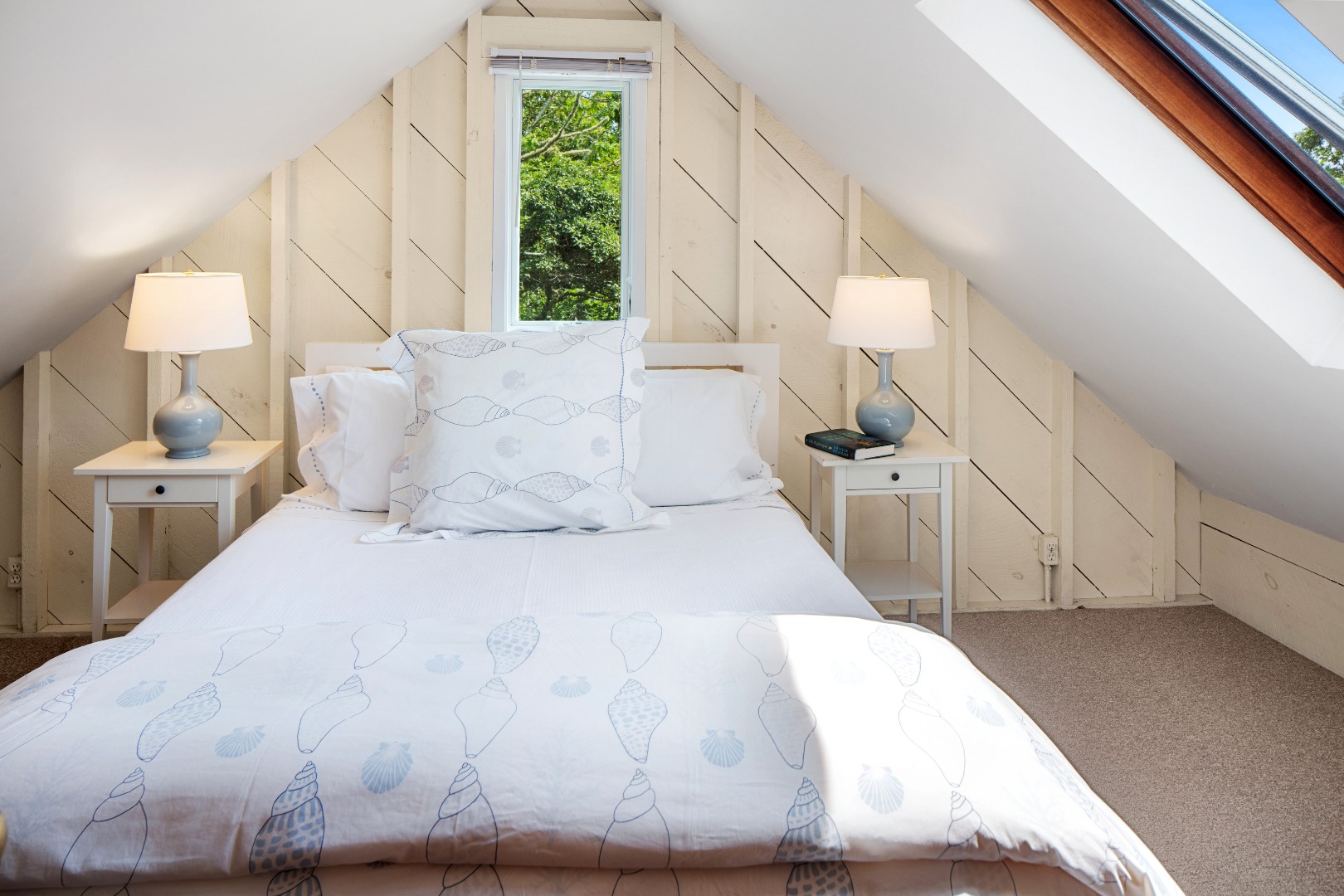 18 Allen Farm Road Chilmark, MA 02535 - Photo 8 of 13 a large bed sitting in a bedroom next to a window