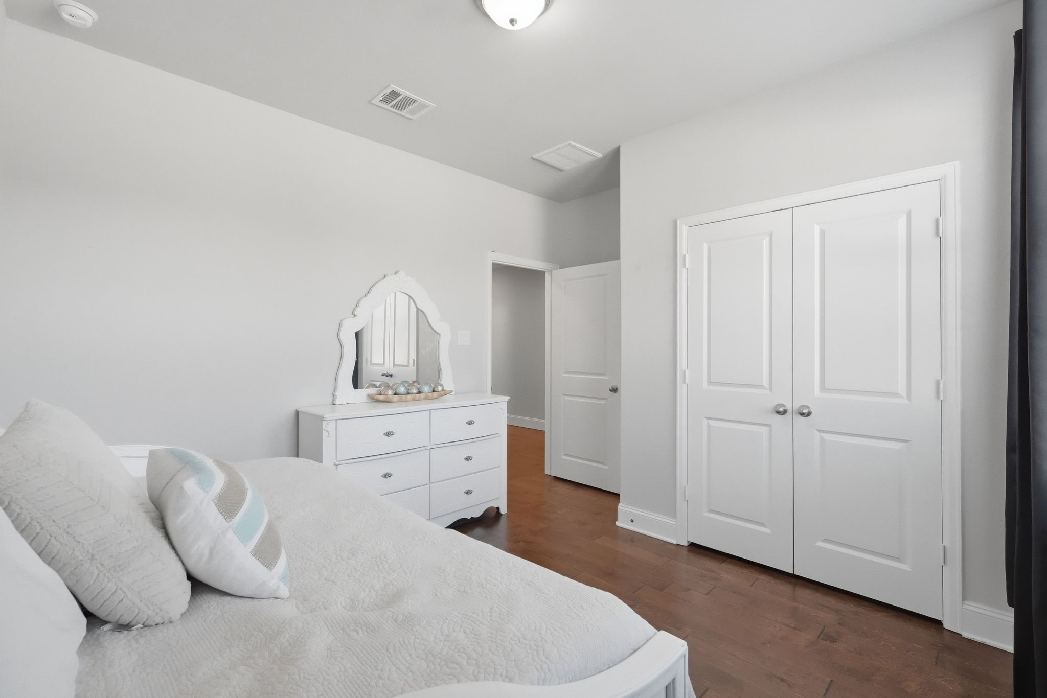 2809 Andante Green Drive Spring, TX 77386 - Photo 25 of 50 a room with a bed and cabinet