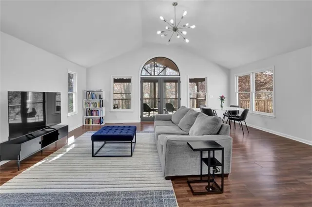a living room with furniture and a flat screen tv