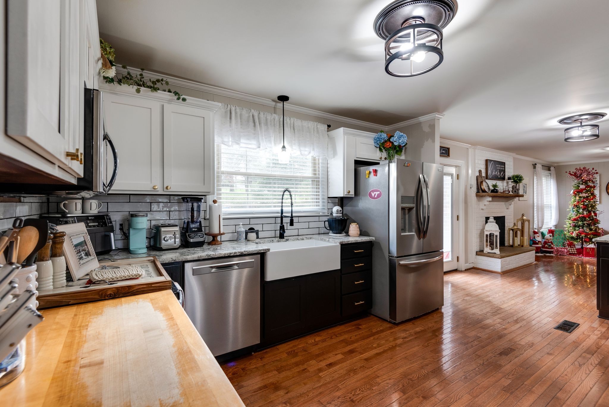 111 Proffitt Street Carthage, TN 37030 - Photo 23 of 38 a kitchen with stainless steel appliances granite countertop a sink a stove and refrigerator
