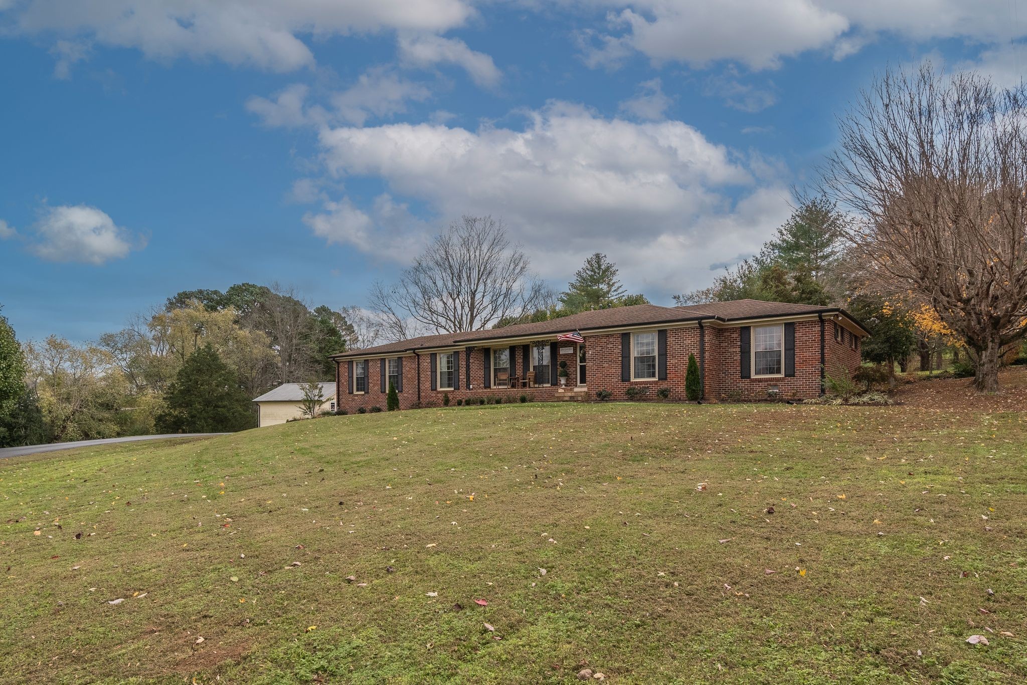 111 Proffitt Street Carthage, TN 37030 - Photo 3 of 38 a view of a yard in front of a house