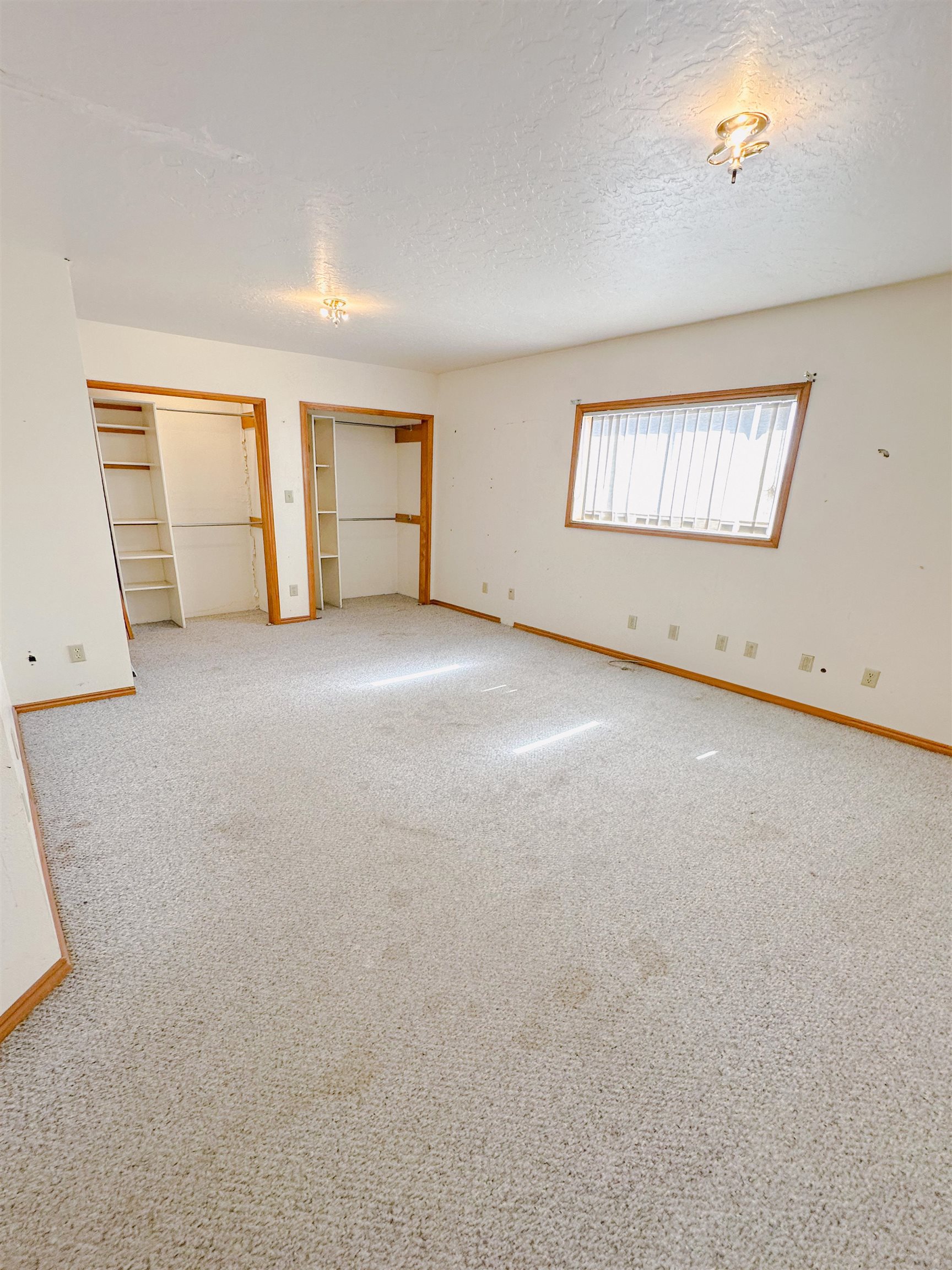 1818 County Road 46 Rangely, CO 81648 - Photo 14 of 23 an empty room with windows