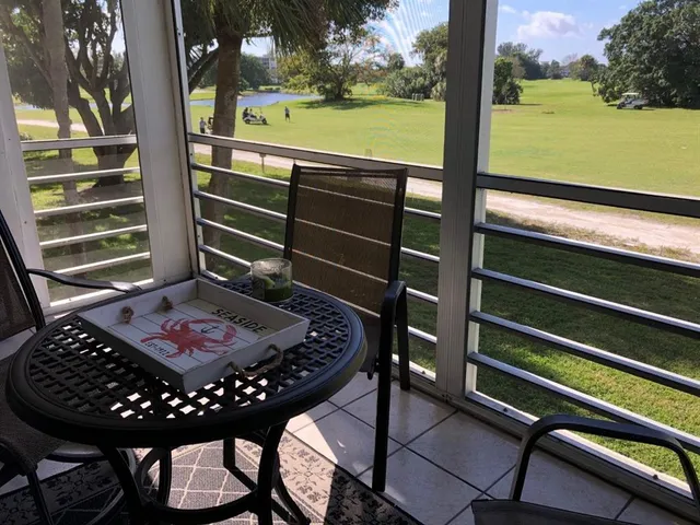 a view of a balcony with an outdoor space