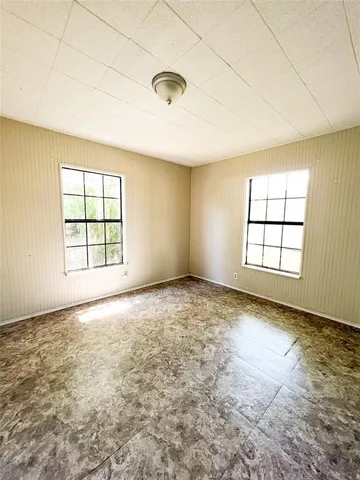a view of a yard with an outdoor seating