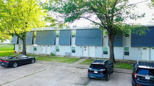 a car parked in front of a house