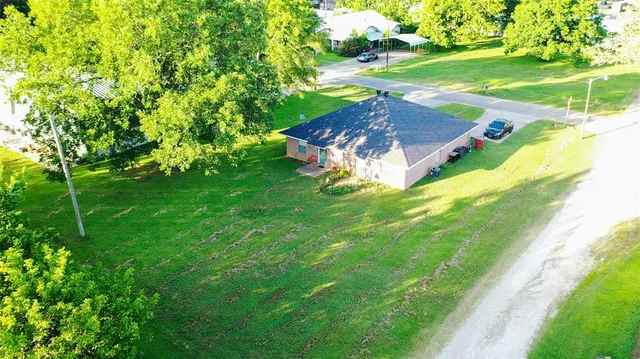 a view of a backyard with a garden