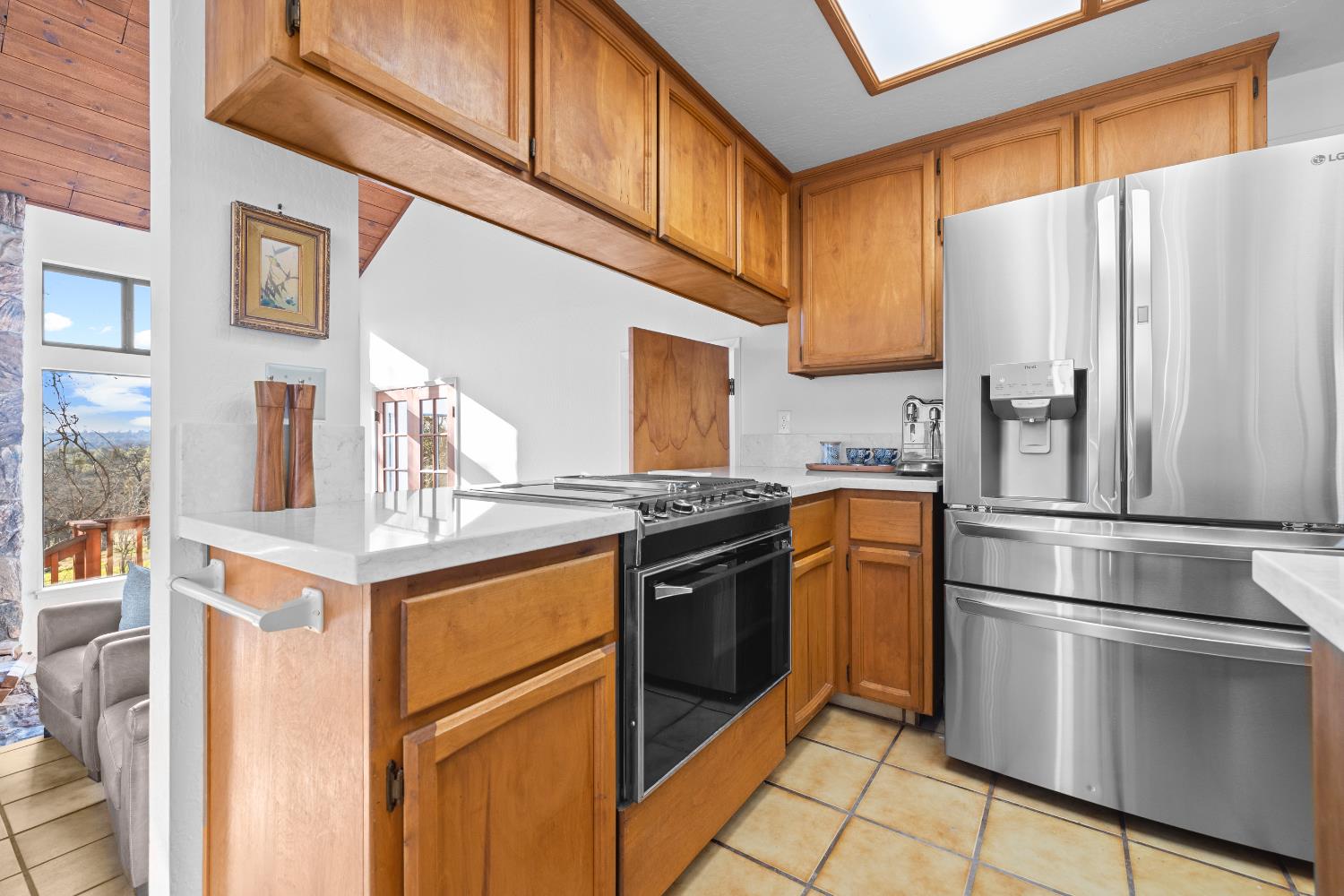 11700 Quail Road Auburn, CA 95602 - Photo 6 of 44 Kitchen overlooking the living room.