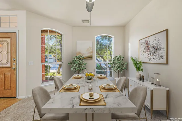 a living room with furniture and decor
